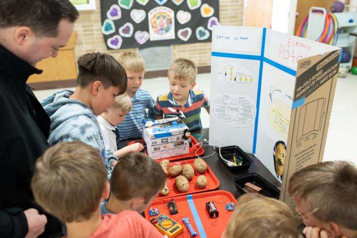 Andres Ledesma (5) demonstrates his electric potatoes