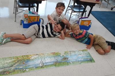 Walter Brunken, Books Ludwig and Wilson Wuerger share their joy in a job well done!