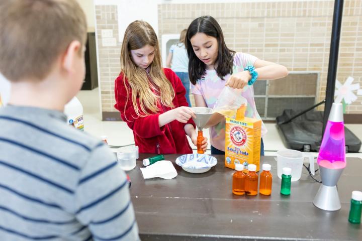 Kayla Ederer and Fatima Gonzalez (5) make lava lamps