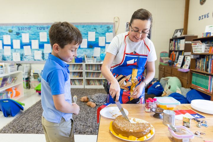 Gabe Ledesma (1) eyes up a yummy cake as he learns about "all things chocolate" from 3rd grade teacher Ms. Andrea.