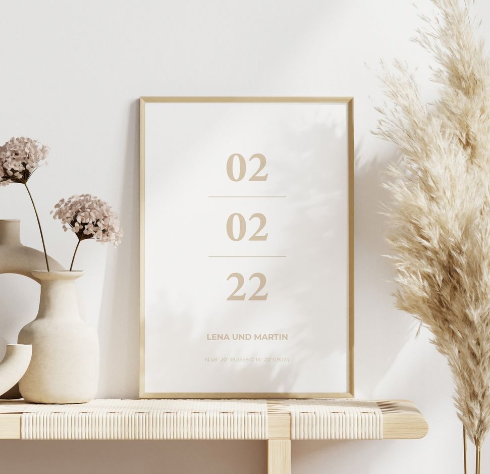 Poster in wooden frame with wedding dates in minimalist design