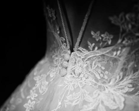 Detail from the back of the wedding dress, b/w image