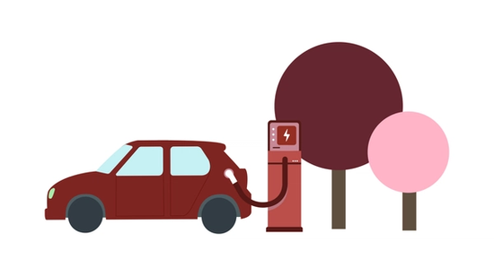 Punainen sähköauto latautumassa latausasemalla kahdella tyylitellyllä puulla taustalla.