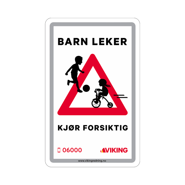 Reflekterende veiskilt som opplyser om at barn leker og om å kjøre forsiktig.