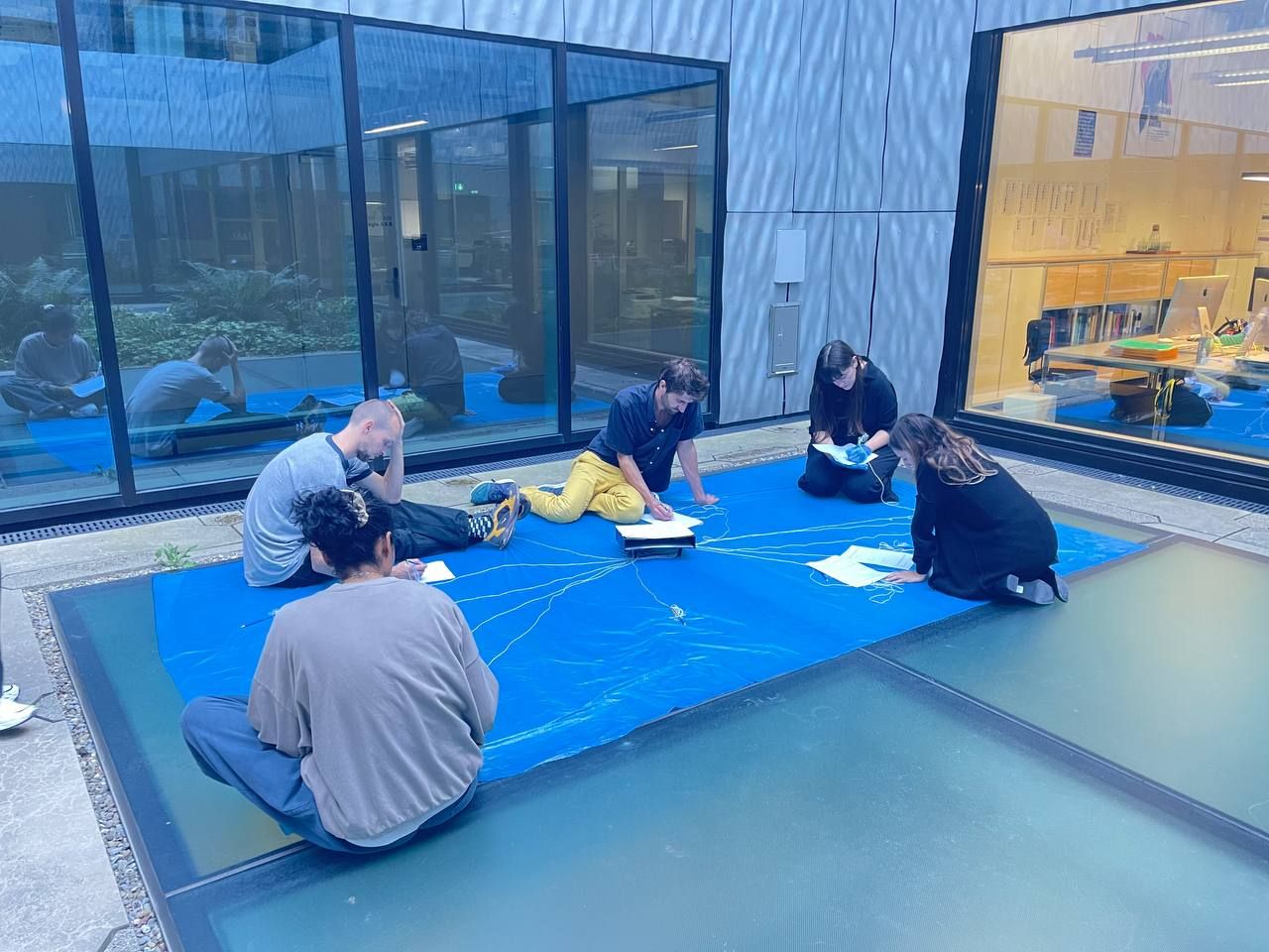 Bureau of Commons is a self-declared territory made of a blue plastic sheet. A performance-installation, the Bureau authorizes people to reflect on Free Movement of Persons collectively. A project by Betül Aksu