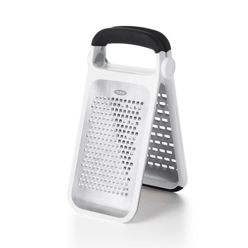 OXO Good Grips Two-Fold Etched Grater standing open on its two grating panels