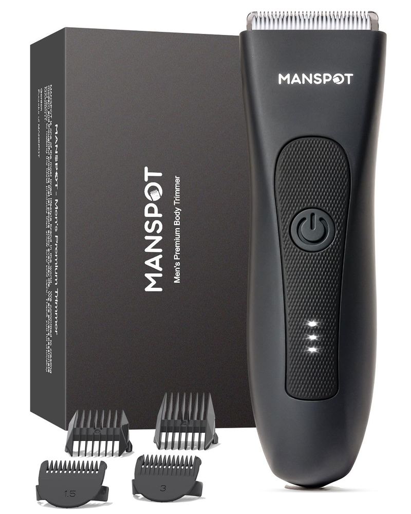 MANSPOT waterproof body hair trimmer with ceramic blade heads and guards.