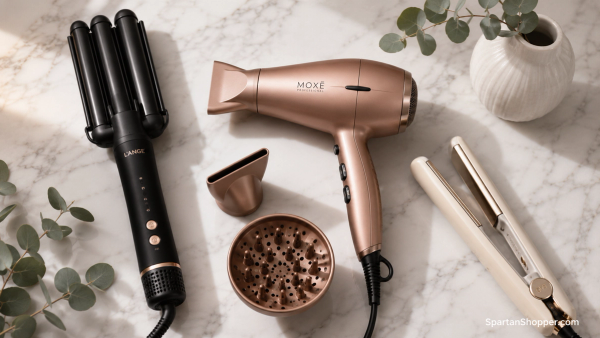 Premium hair styling tools including a multi-styler, hair dryer, and straightener arranged on a white marble surface.
