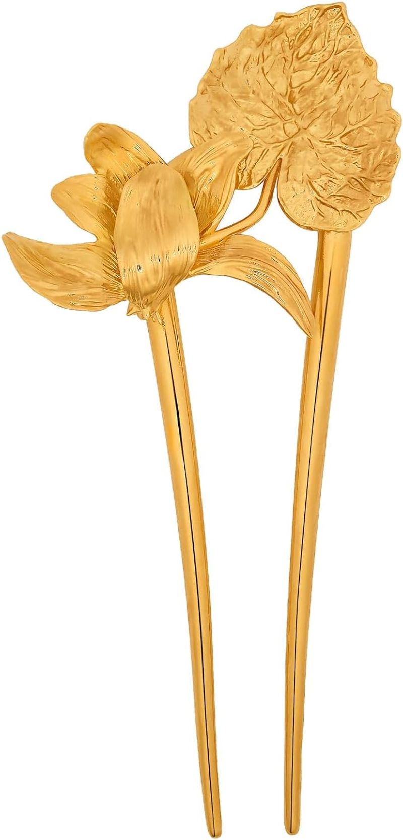 Oscar de la Renta Cyclamen hairpin with gold hardware.