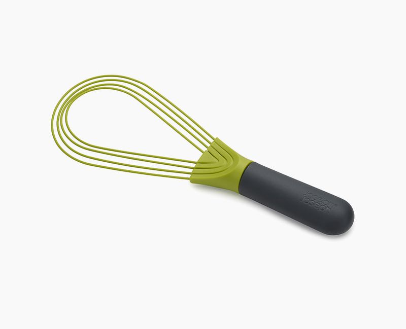 Joseph Joseph Twist gray and green whisk in its flat configuration