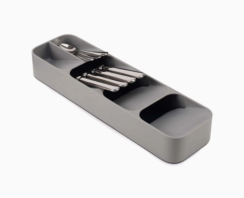 Joseph Joseph compact gray DrawerStore organizer with cutlery in angled compartments