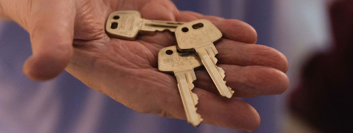 Husnøkler i åpen hånd
