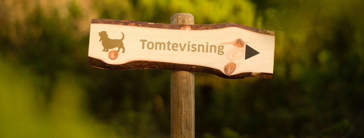 Skilt med tomtevisning