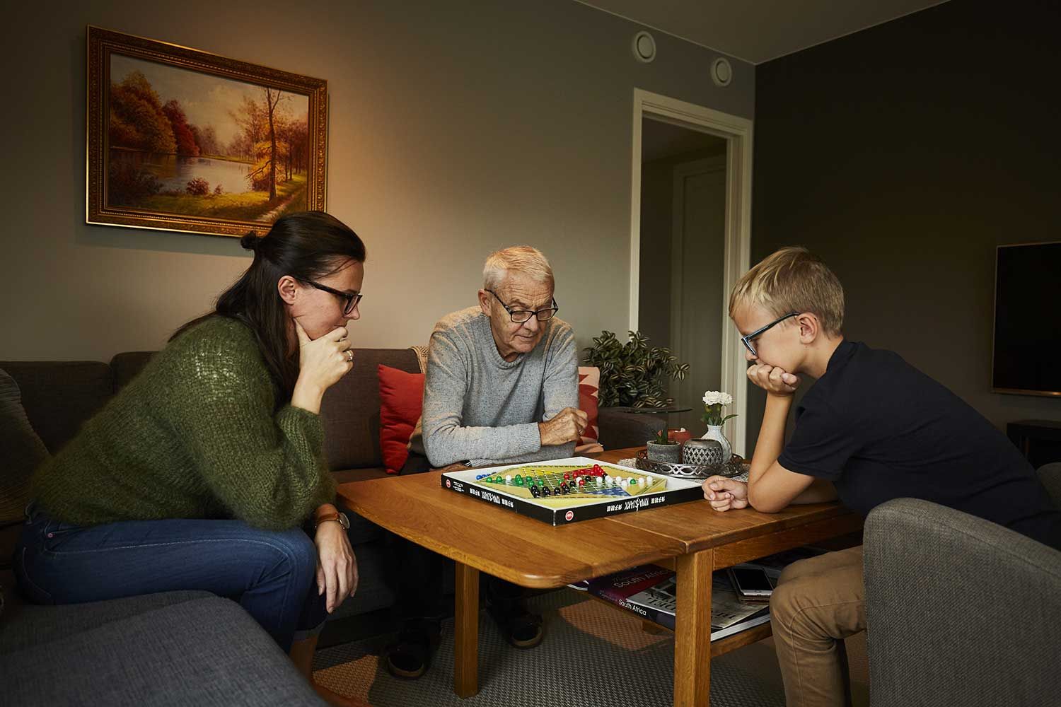 familie spiller kinasjakk