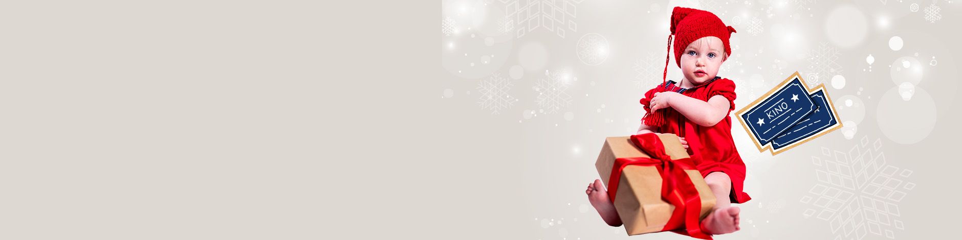 jentebaby med gave og billetter