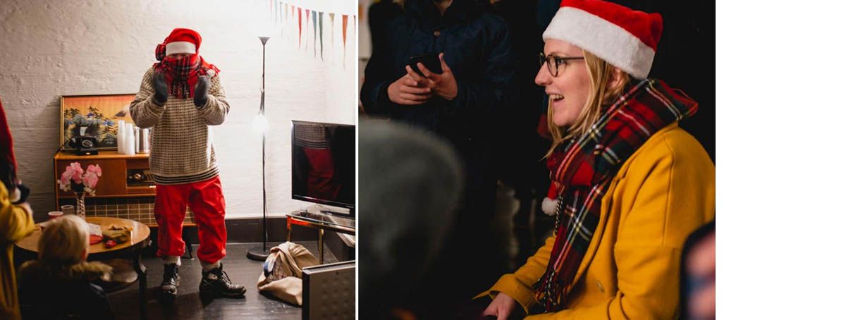 Mann utkledd som nisse og dame med nisselue