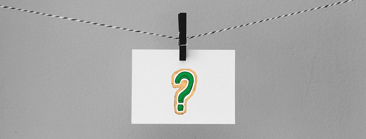 spørsmålstegn på et papir
