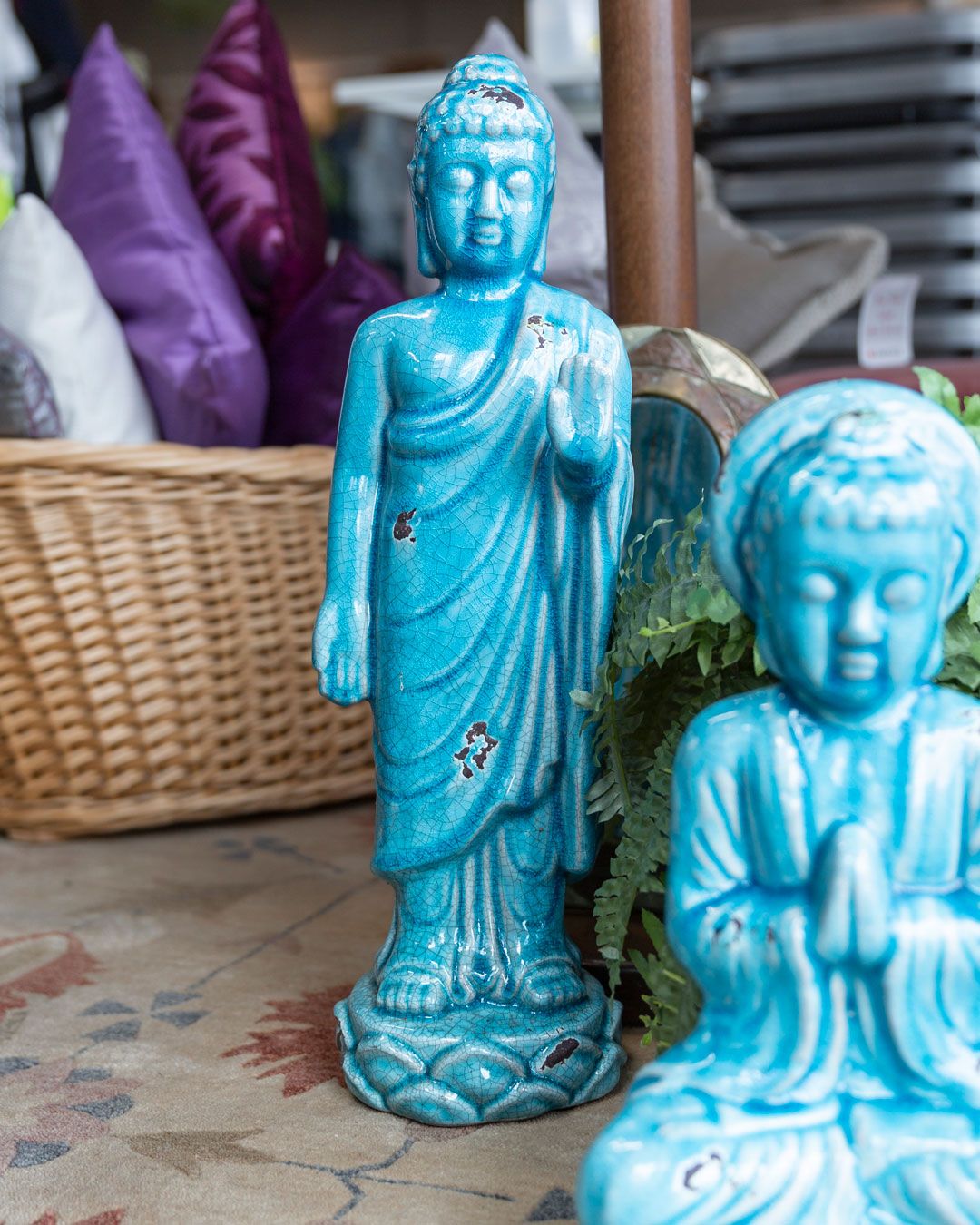To blå Buddah-figurer 