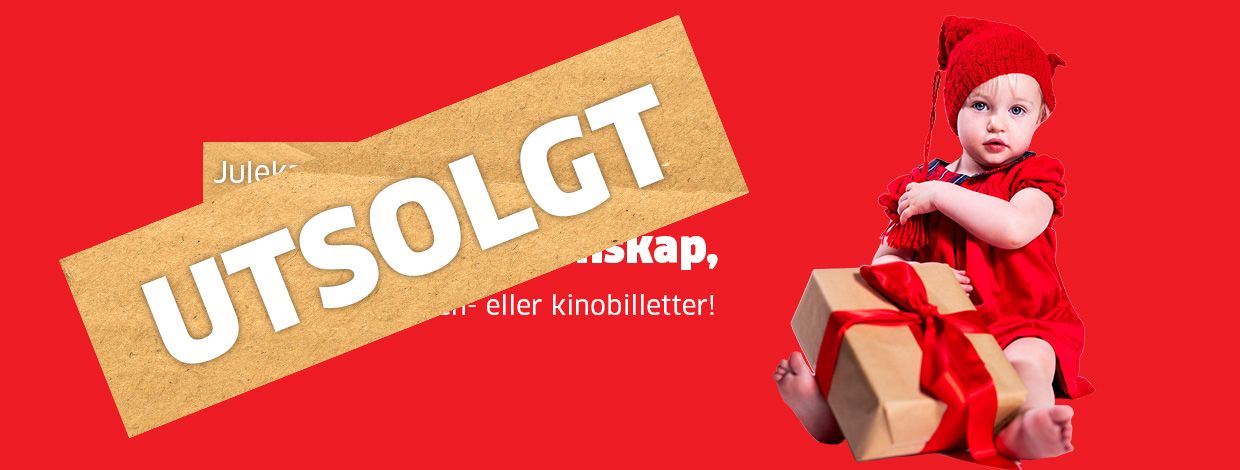 liten jentebaby med gave i fanget