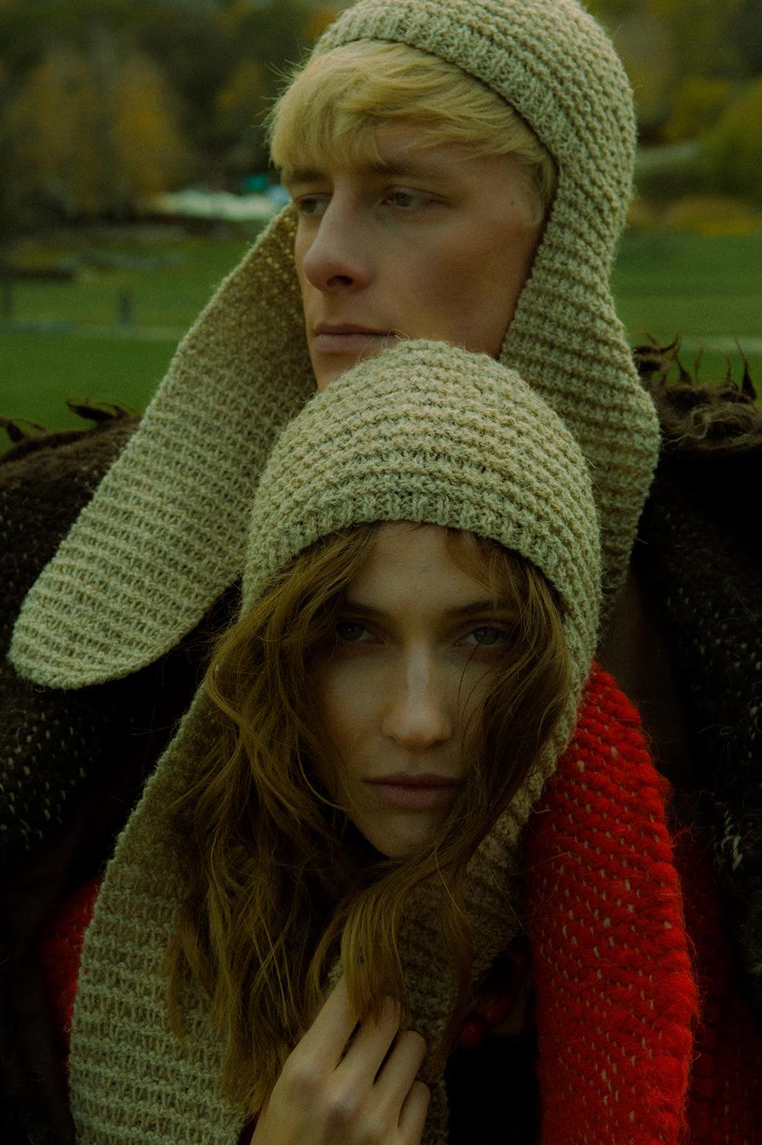 Close-up of models in textured knitwear and organic fabrics, showcasing a Ukrainian-Scandinavian ethno-fashion campaign.