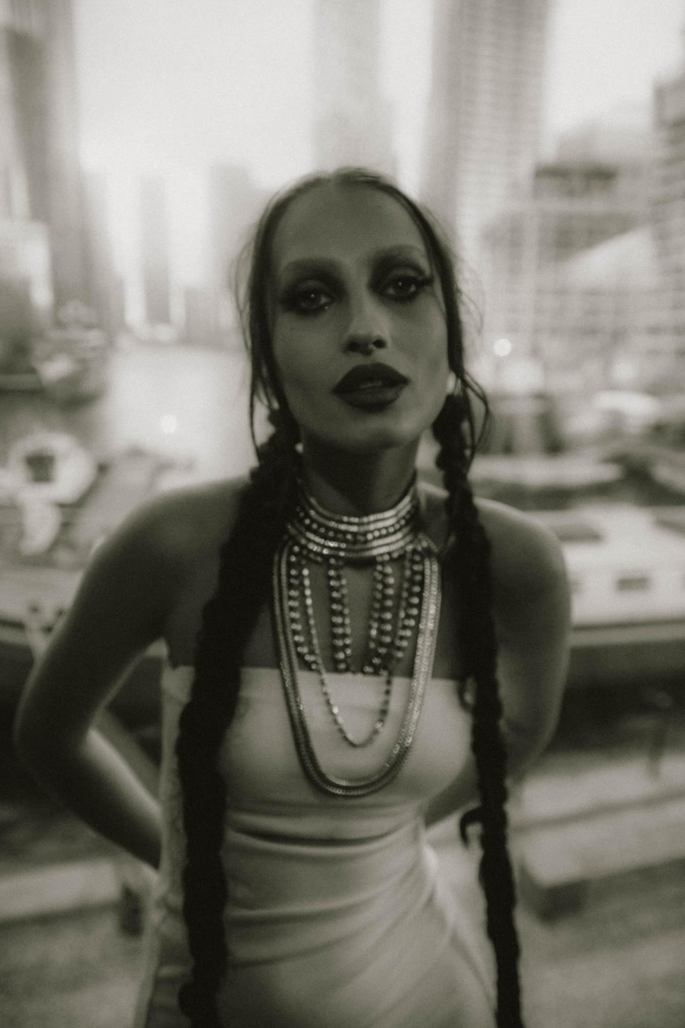 Close-up black and white portrait of woman with decorative details, dramatic contrast, editorial fashion, Canary Wharf London