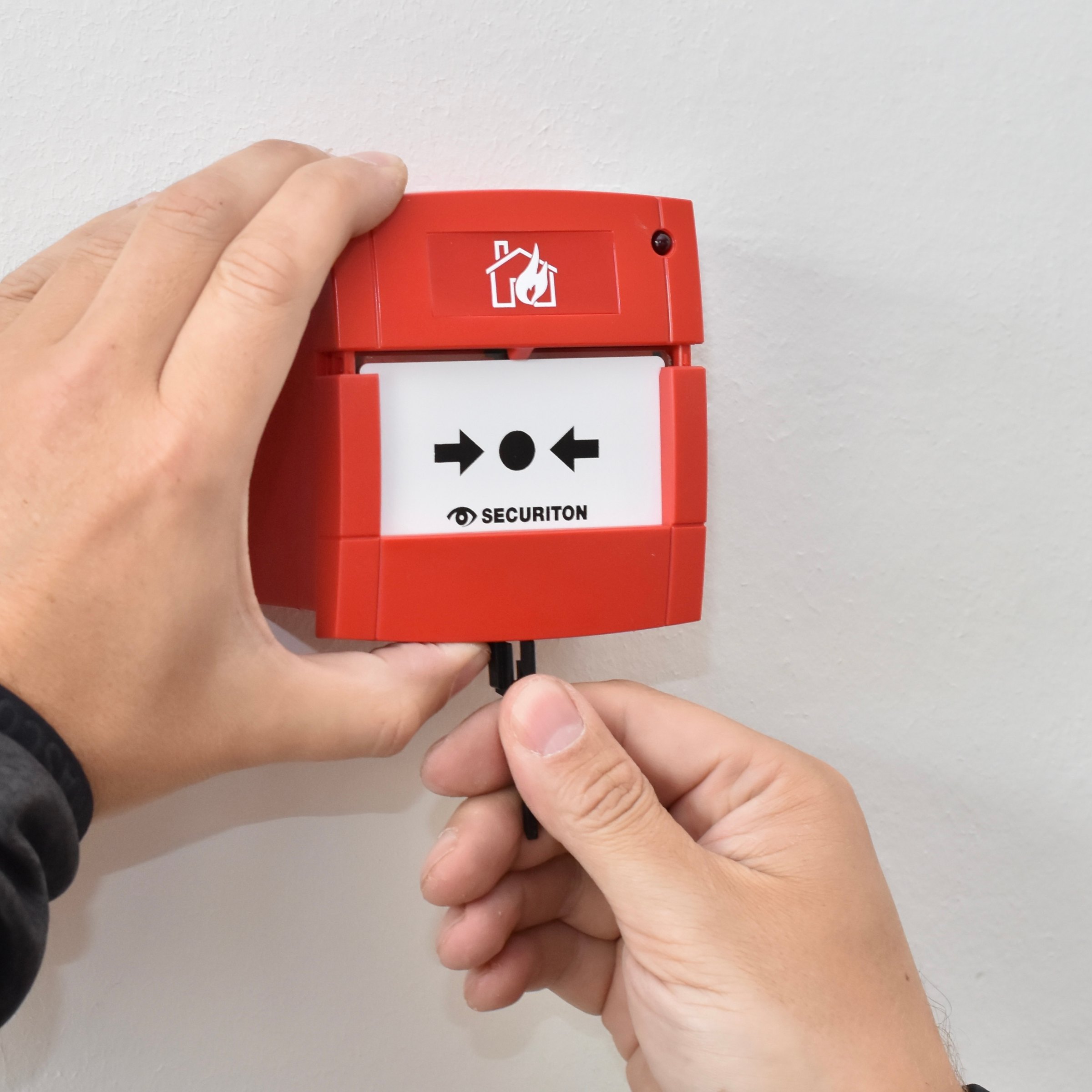 Handbrandmelder Securiton testen