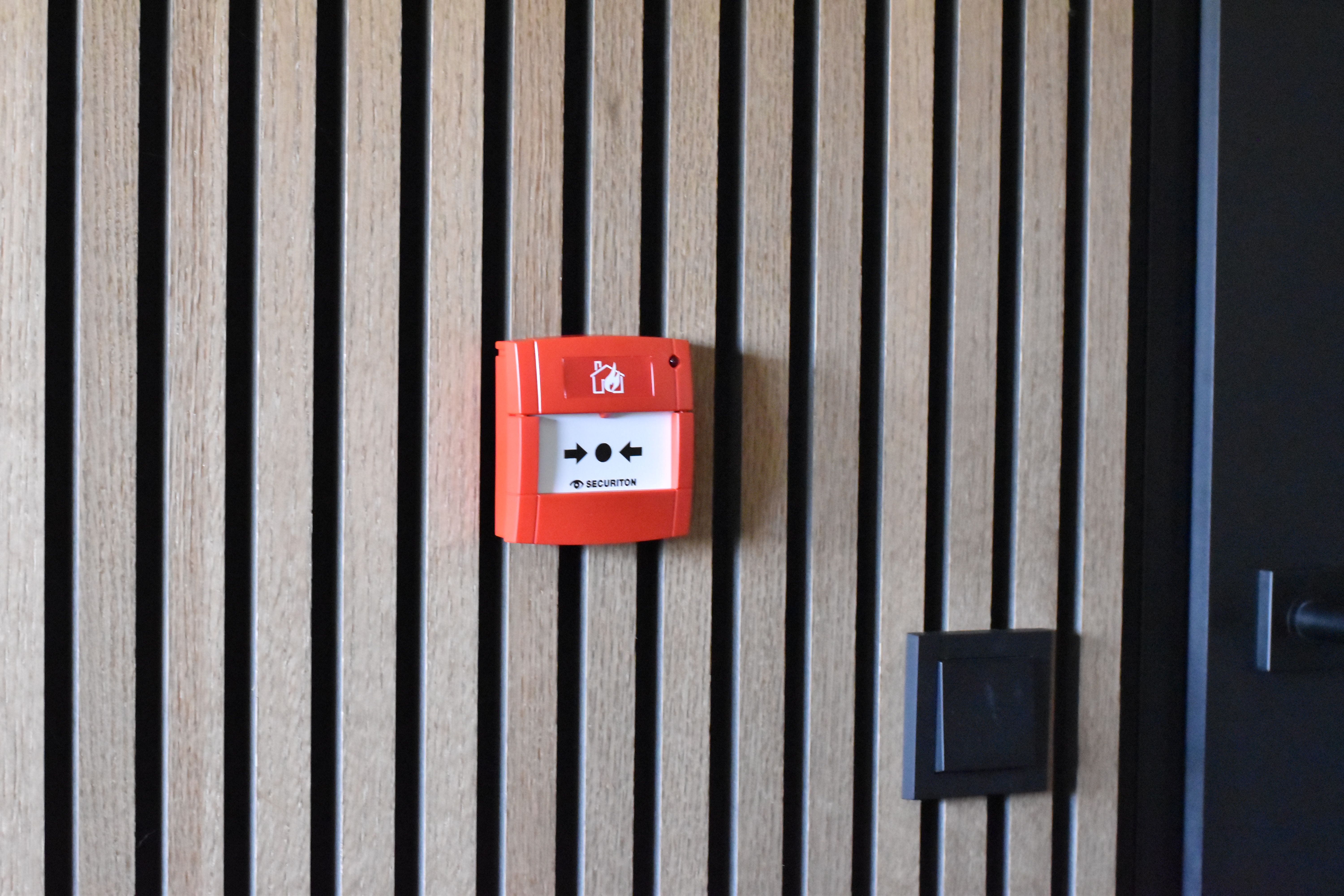 handbrandmelder muur
