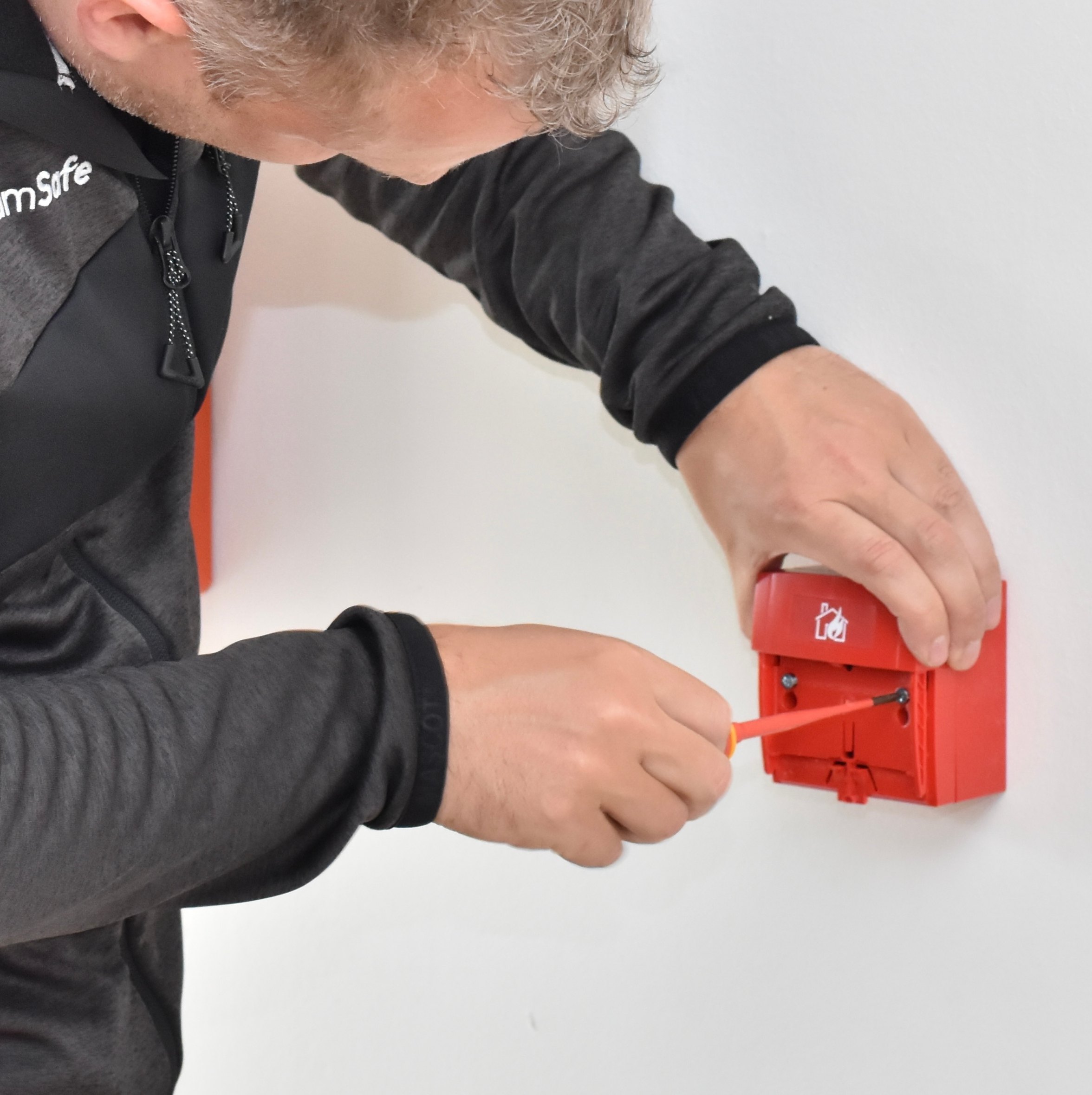 Handbrandmelder Securiton onderhouden