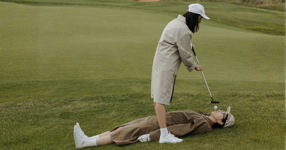 Two golfers performing odd golf