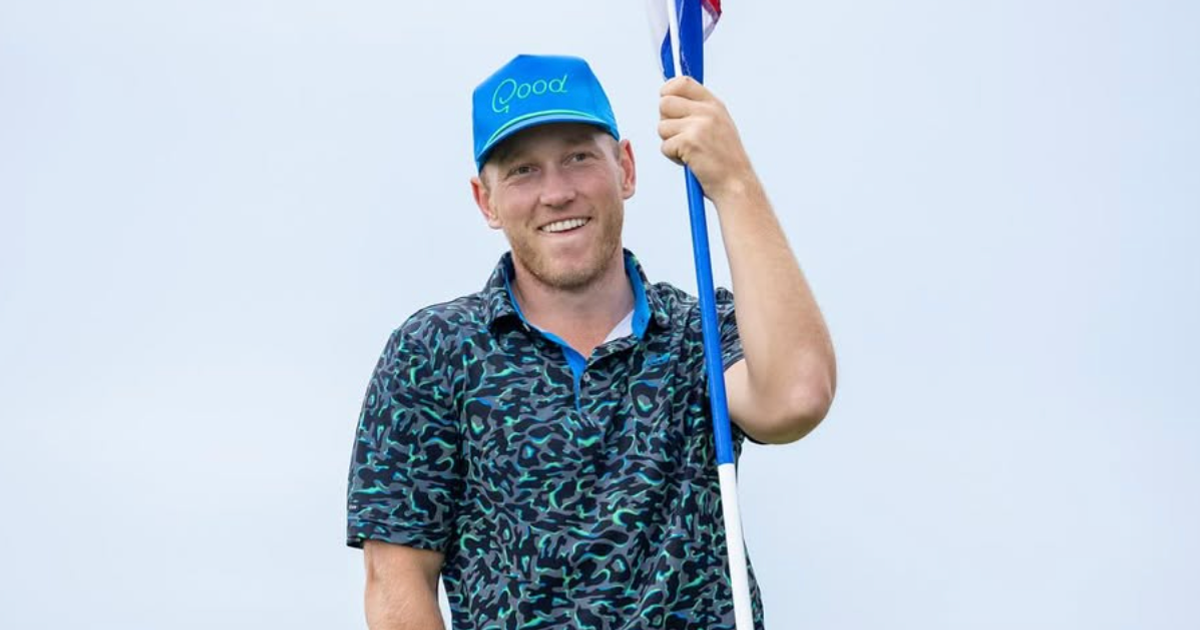 Brad Dalke holding flagstick