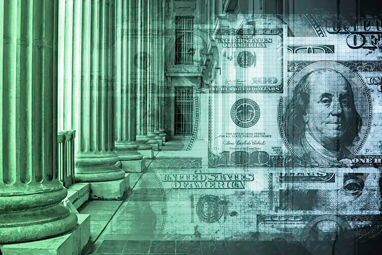 Fotomontaje de un edificio gubernamental con columnas sobre un billete de Estados Unidos.