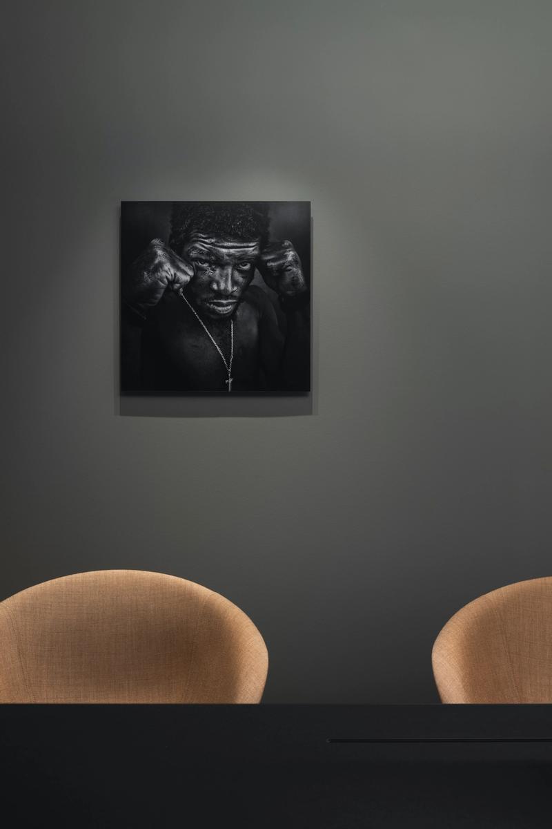 The picture shows an art piece in an office.