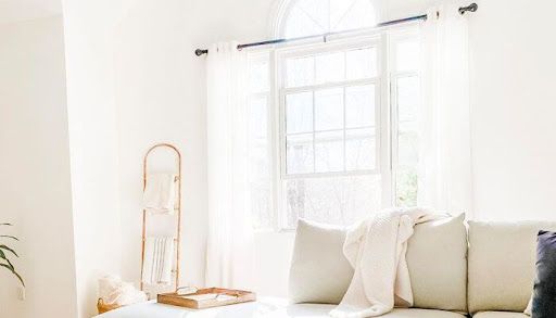 Kwik-Hang curtain rod brackets in a living room
