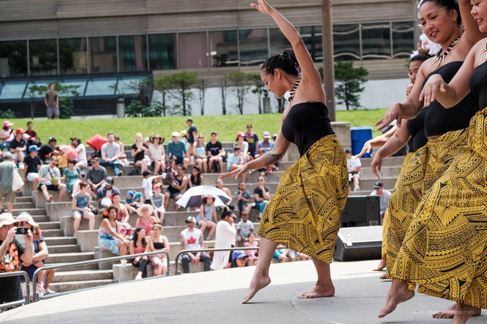 Dancer performing to a packed audience at AlohaFest Toronto