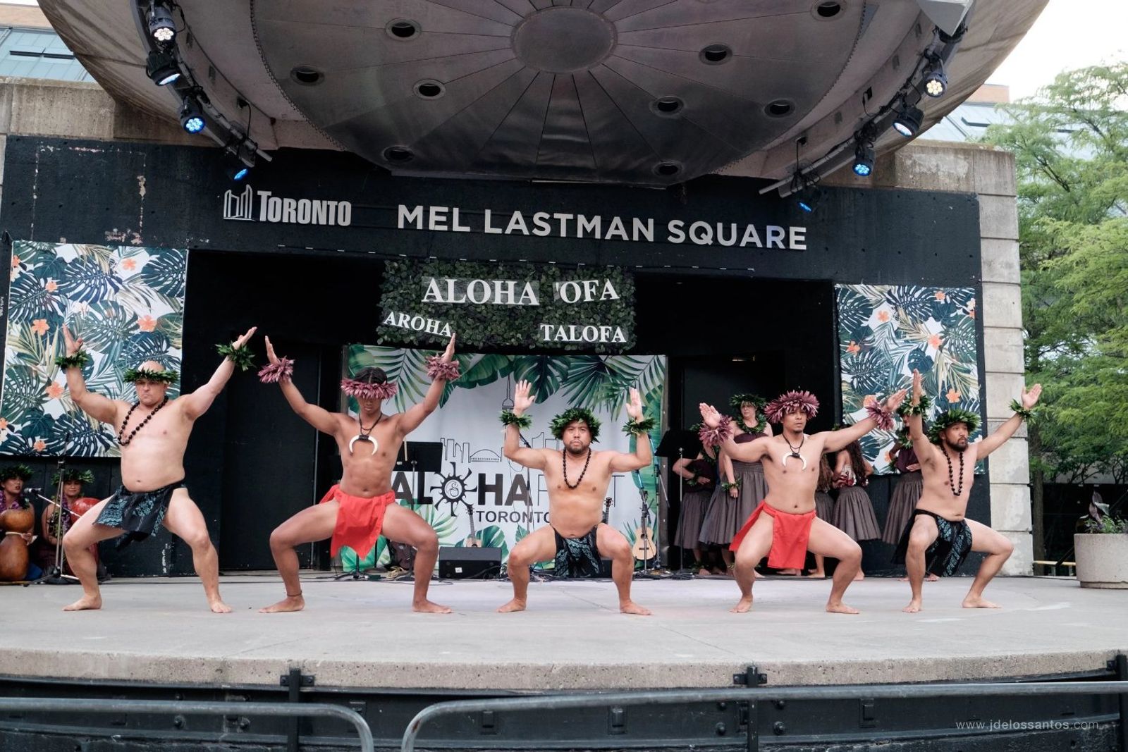 Male hālau dancers performing at AlohaFest Toronto