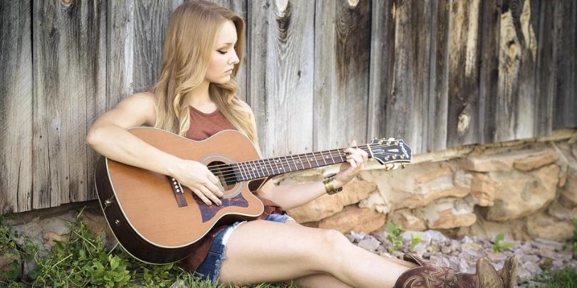 O que eu preciso aprender primeiro para tocar violão com êxito