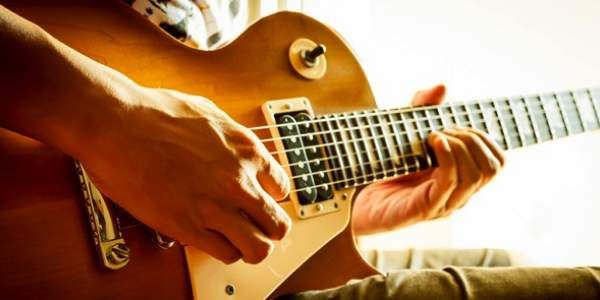 Como tocar Violão como um Profissional – Não é como você pensa!