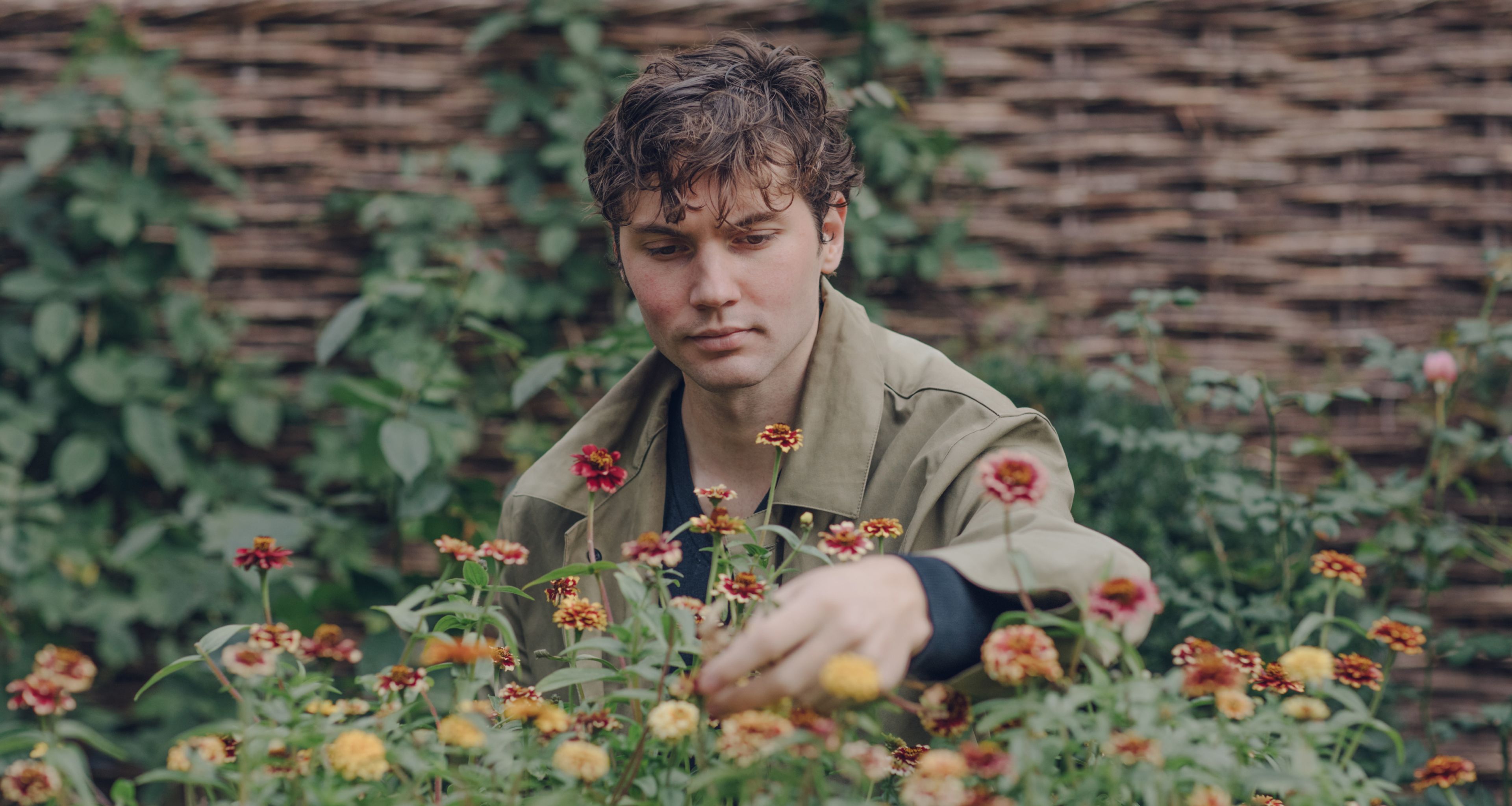 arthur cutting flowers