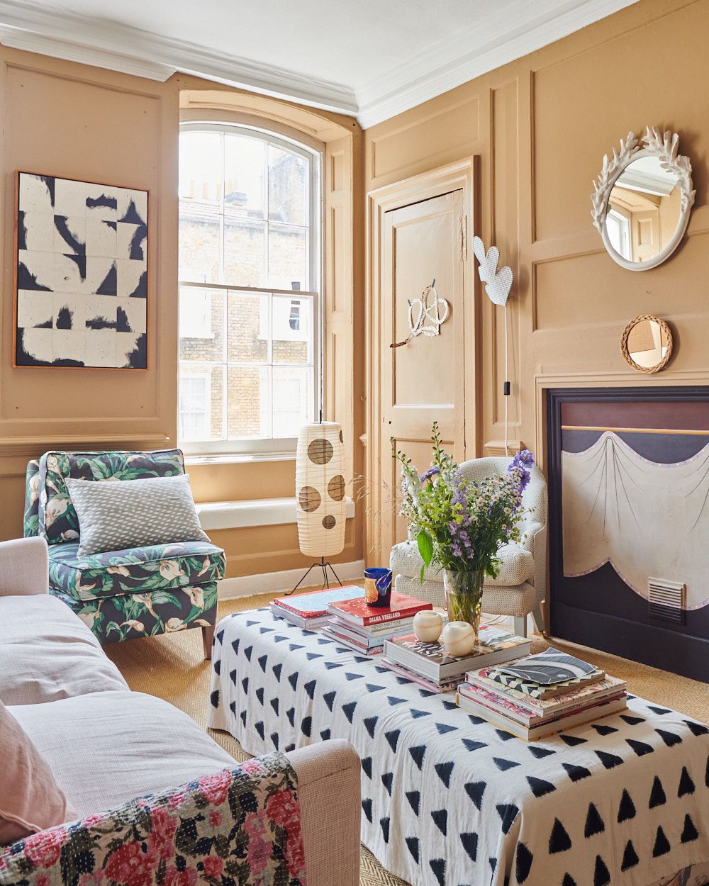 A photo of Gabby Deeming's sitting room painted a mid-toned yellow. 