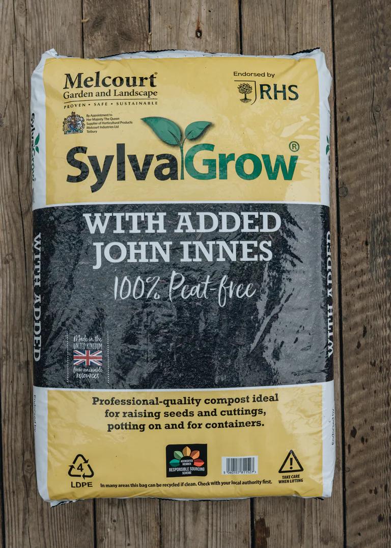 An image of a bag of Melcourt Sylva Grow Peat Free compost. The bag is yellow with an image of the compost in the middle.