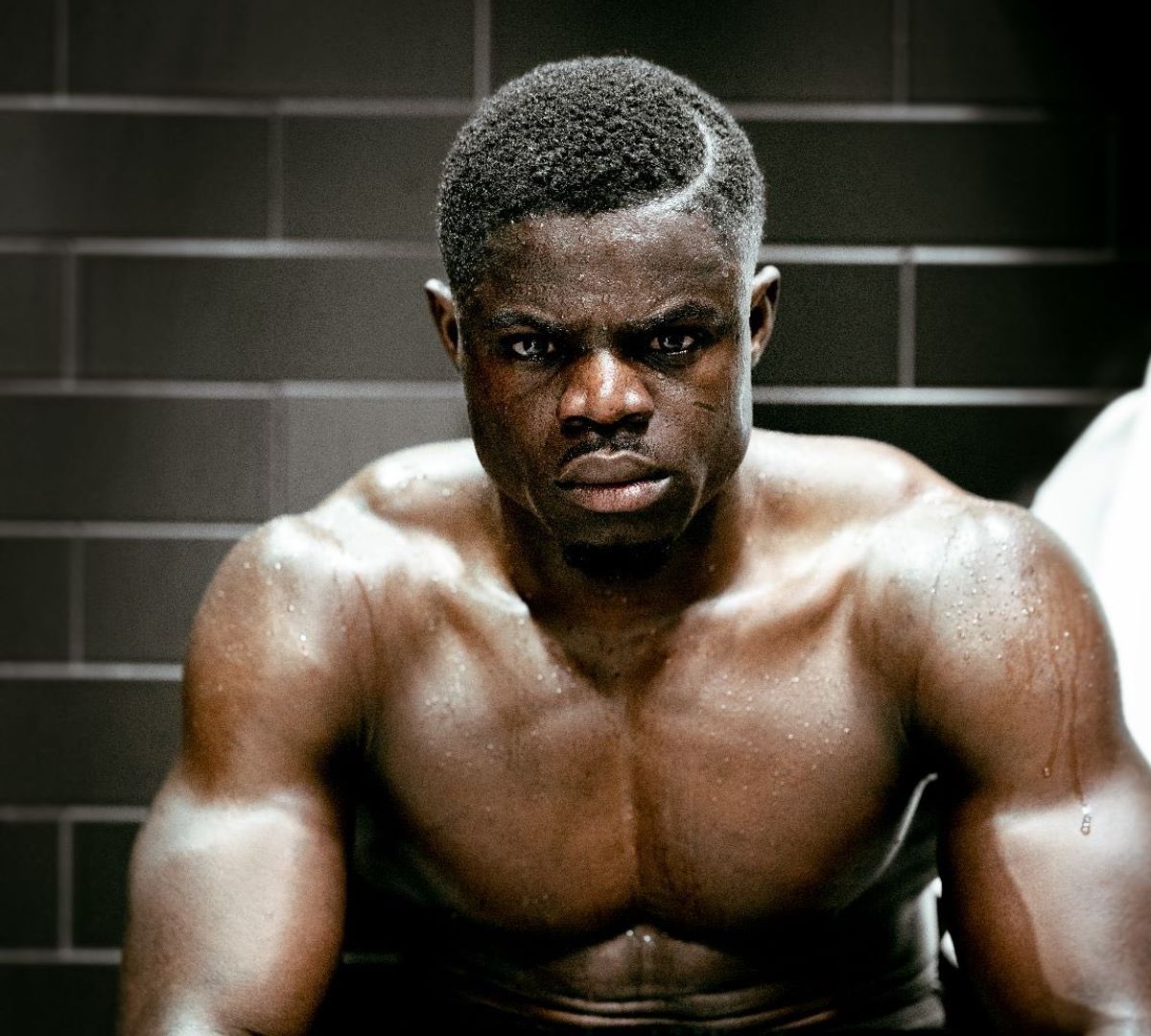 A picture of Professional boxer Seth "Freezy Macbones" Gyimah sitting