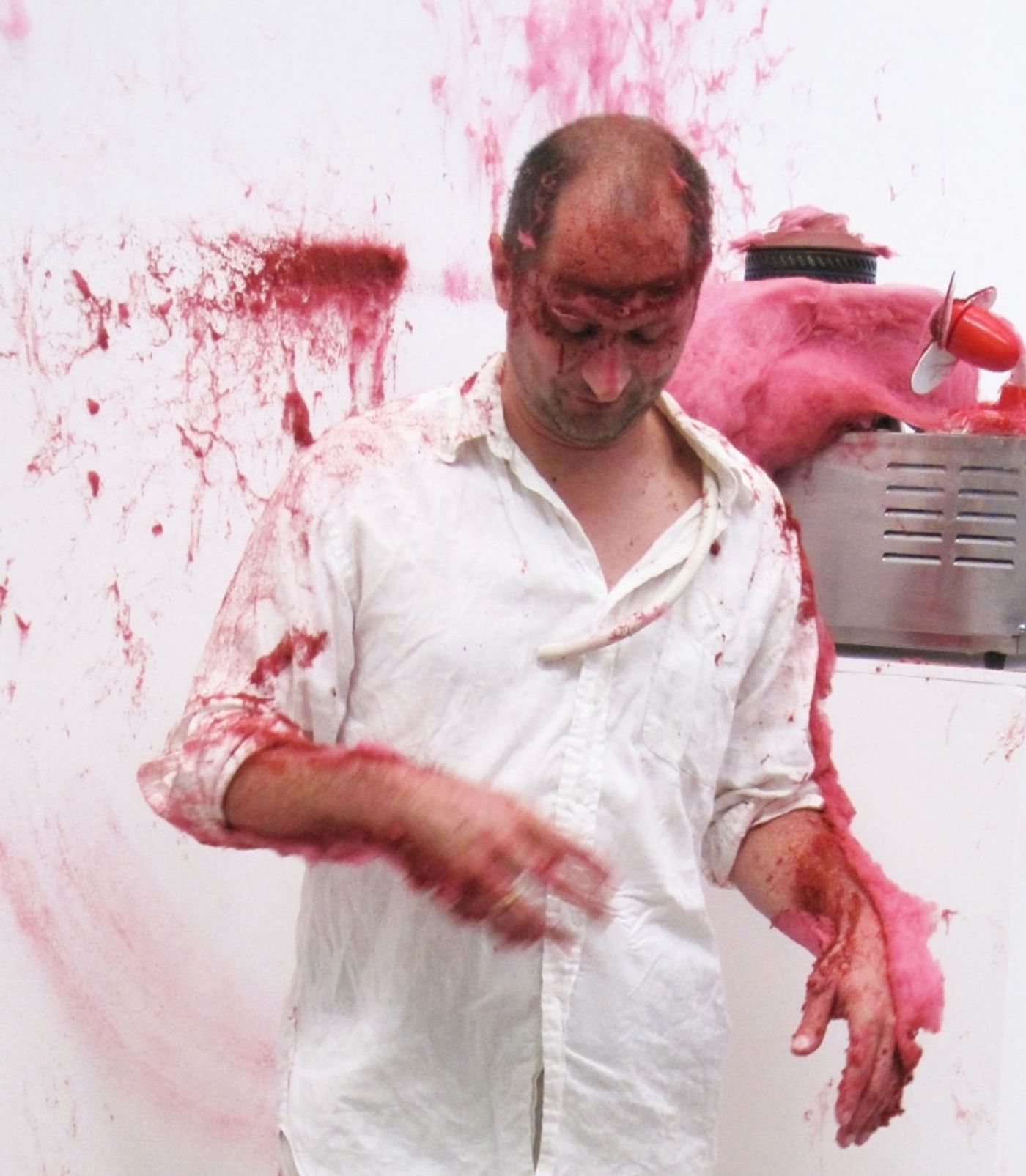 SLAPPED IN THE FACE TILL YOUR SHIT TURNS RED_______performance, cotton candy machine/ 2009 / CAN, Centre d'Art Neuchâtel, Switzerland