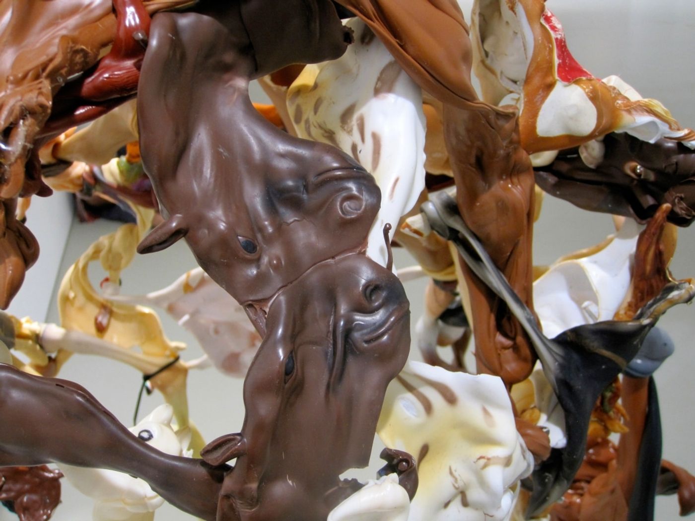 WILD HORSES COULDN'T DRAG ME AWAY_______ 190 x 120 x 130 cm / melted plastic horses, rubber