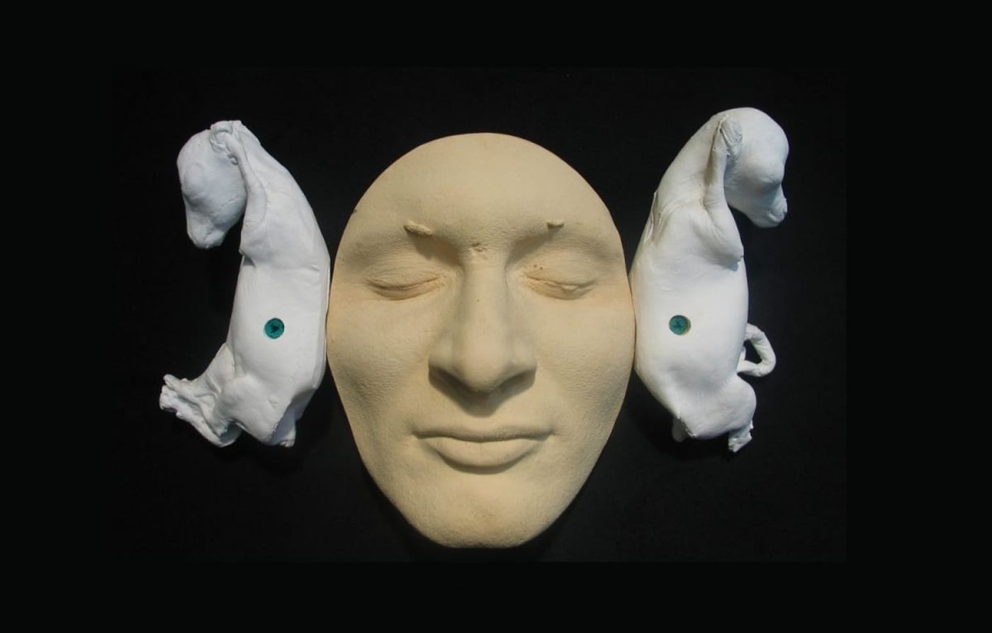 THE LISTENER_______plaster self-portrait with goats fetuses / 1999