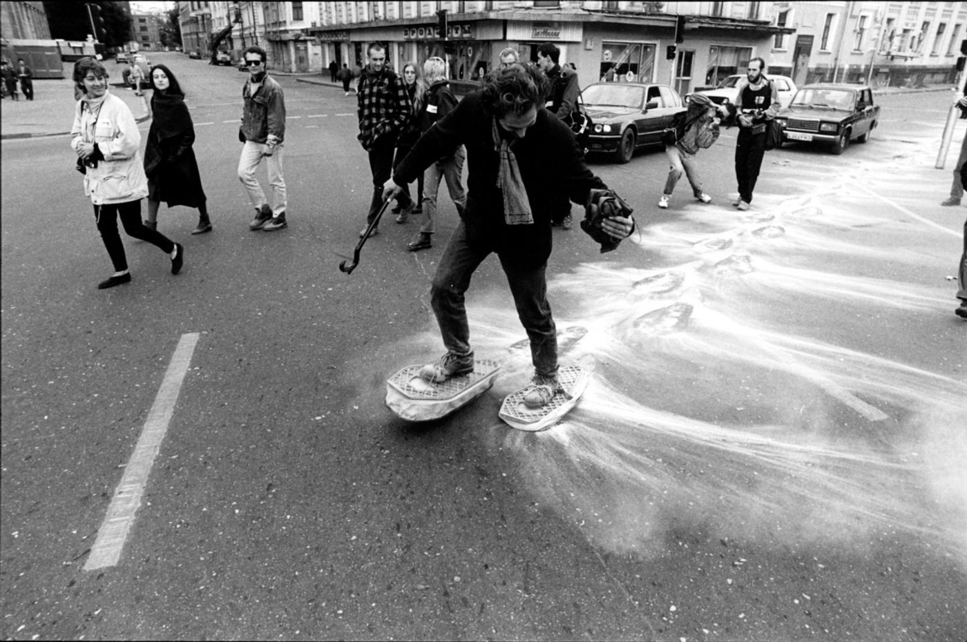 SNOWSHOES_______an ongoing performance, snowshoes containing white flour are leaving marks while walking in different cities / MOSCOW / 1993 —