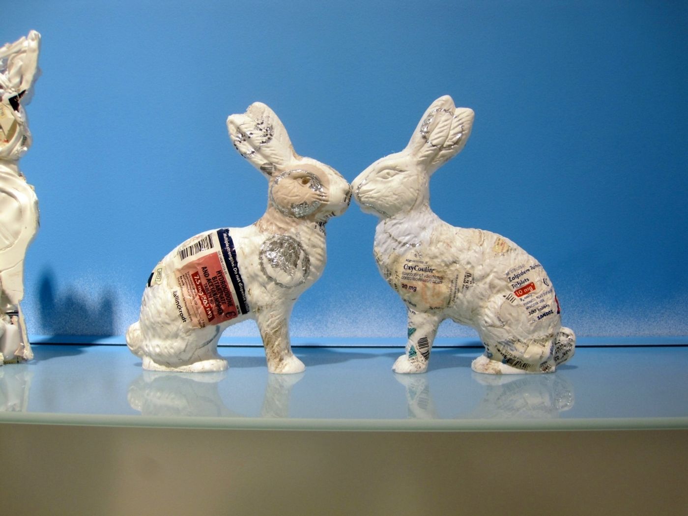 PHARMACEUTICAL LANDSCAPE_______30 x 500 cm / melted pill bottles in the form of Easter bunnies, glass