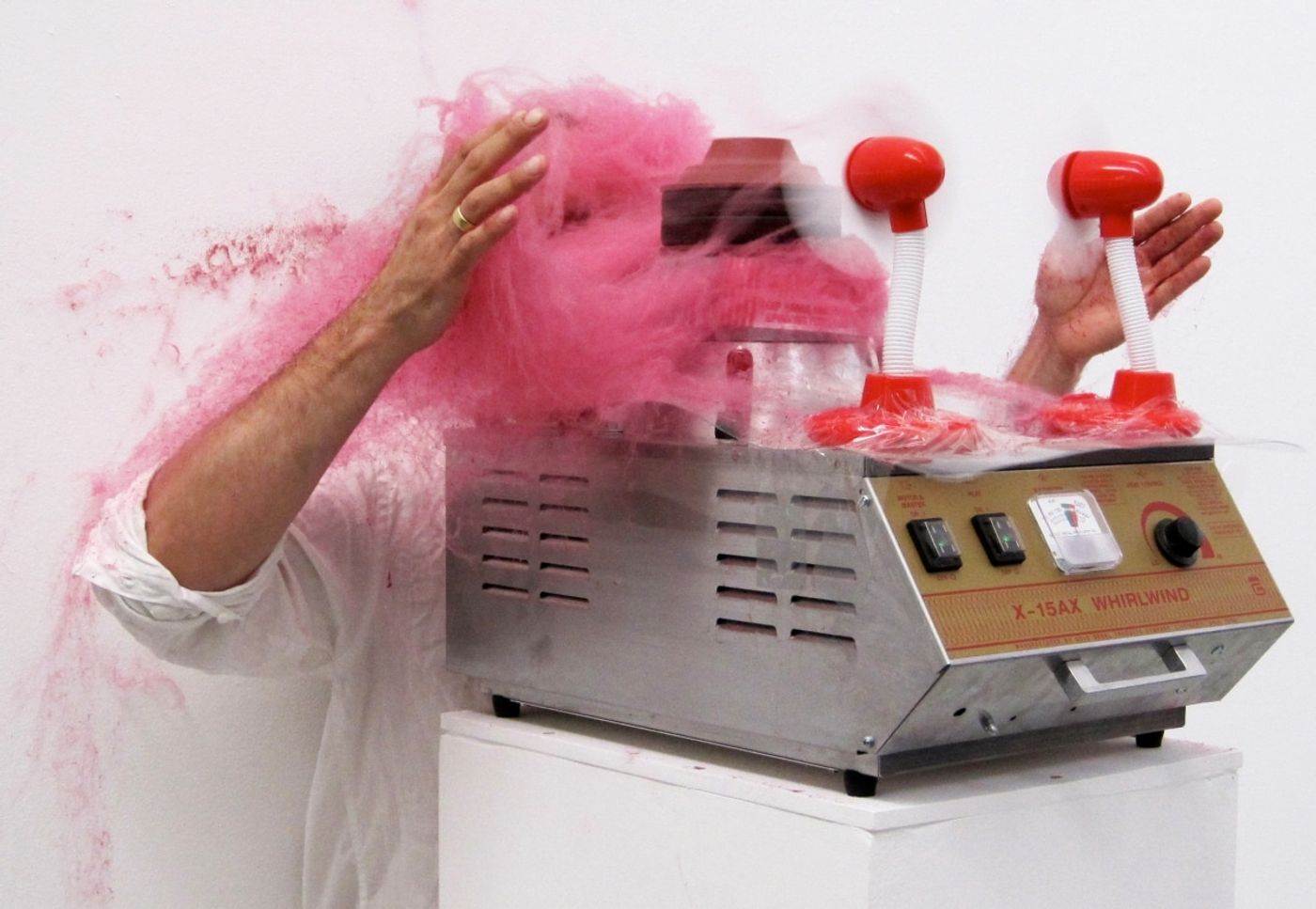 SLAPPED IN THE FACE TILL YOUR SHIT TURNS RED_______performance, cotton candy machine/ 2009 / CAN, Centre d'Art Neuchâtel, Switzerland