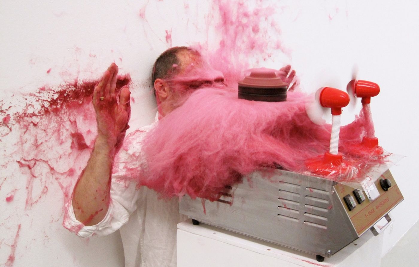 SLAPPED IN THE FACE TILL YOUR SHIT TURNS RED_______performance, cotton candy machine/ 2009 / CAN, Centre d'Art Neuchâtel, Switzerland