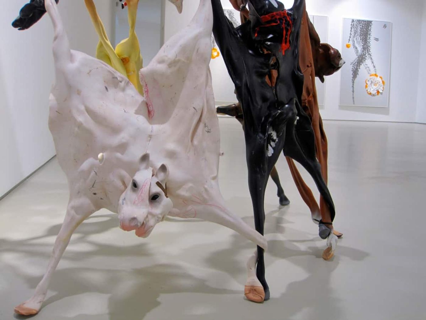 WILD HORSES COULDN'T DRAG ME AWAY_______ 190 x 120 x 130 cm / melted plastic horses, rubber