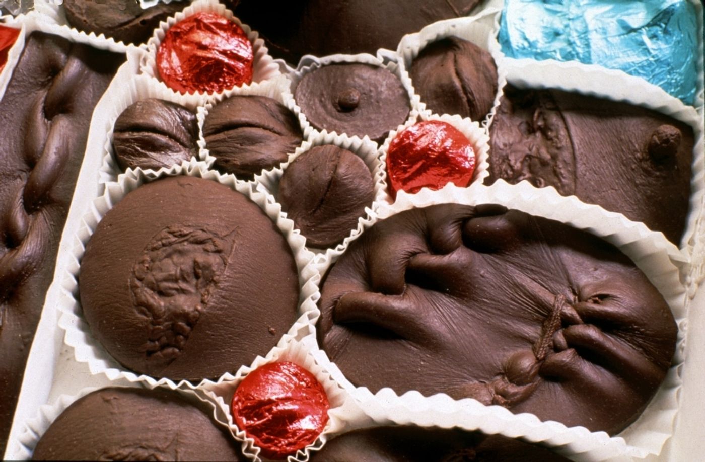 UNIDENTIFIED. RUSSIAN MORGUE CHOCOLATES_______impressions from wounds cast in dark chocolate / 44 X 48X 8 cm / 1994